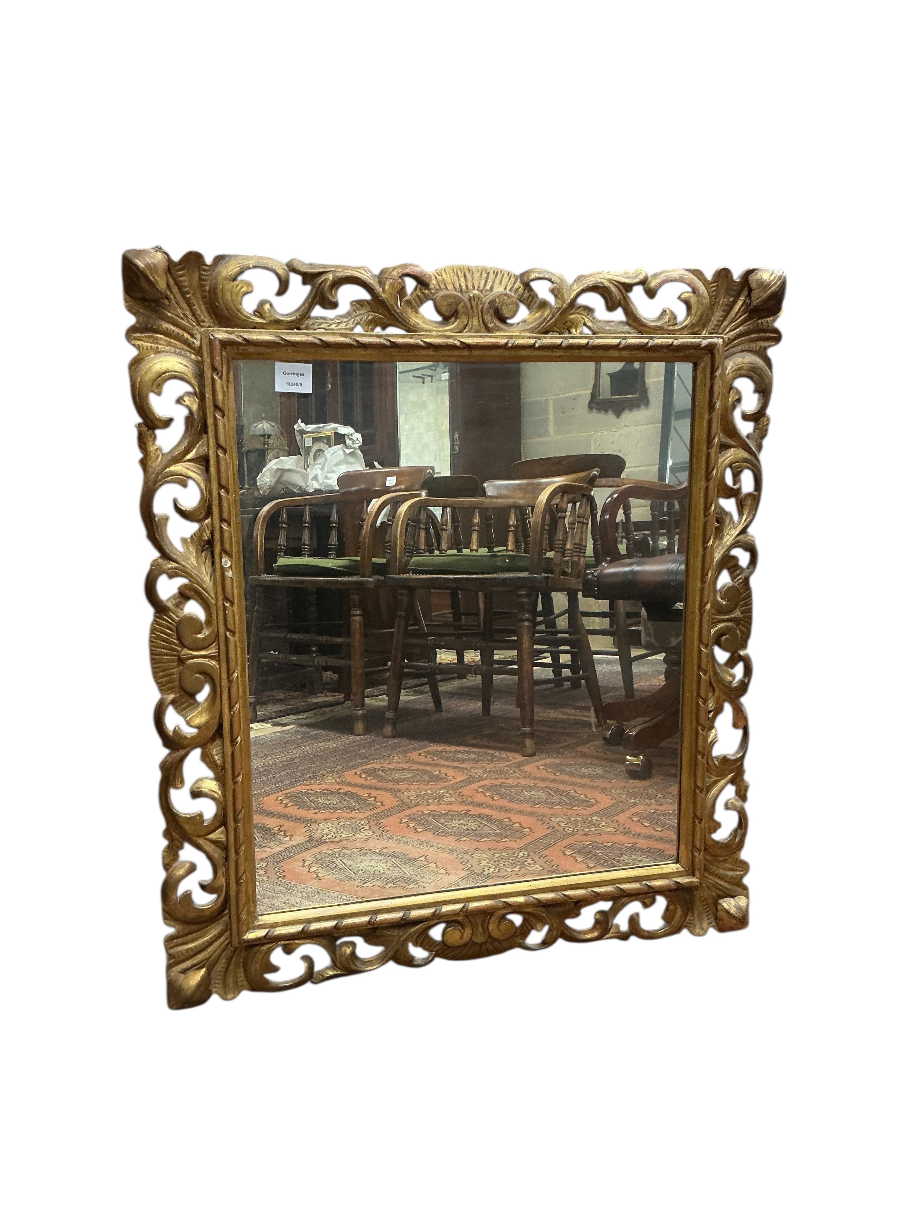 A Florentine style wall mirror, width 78cm, height 88cm